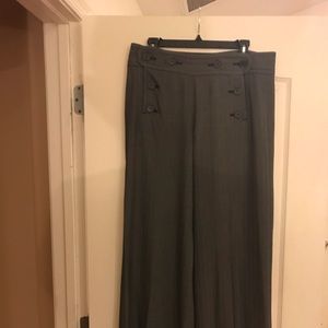 Charcoal gray high waisted wide leg pants.